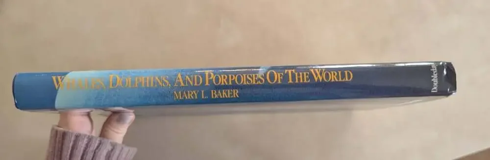 Whales, Dolphins, and Porpoises of the World by Mary L. Baker Hardcover Book